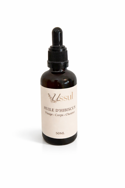 Huile d’hibiscus Ussul 50ml soin naturel visage corps cheveux fond blanc avec ombre