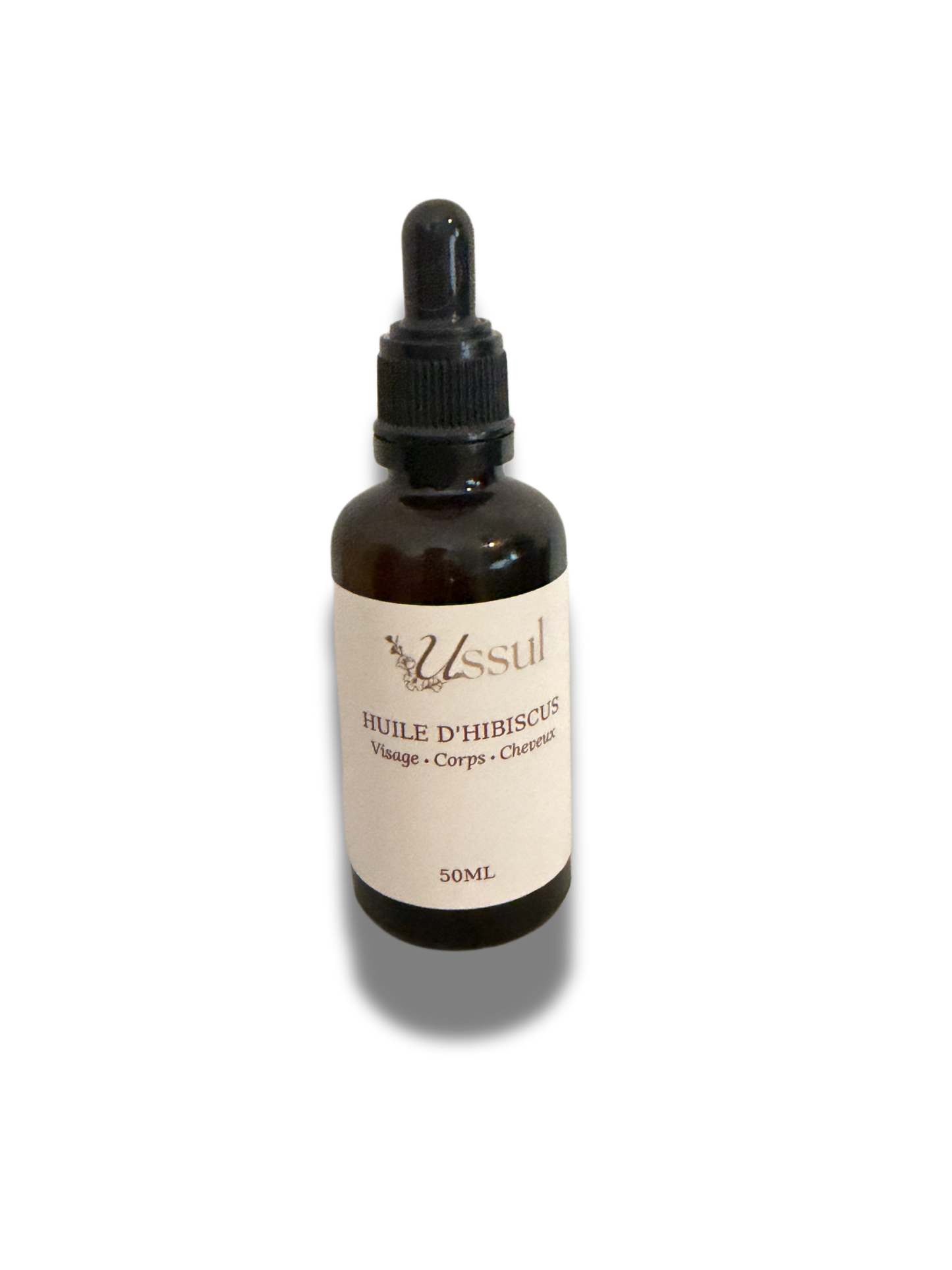 Huile d’hibiscus Ussul 50ml soin naturel visage corps cheveux fond blanc avec ombre
